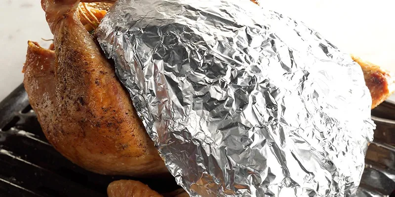 Put Foil On Turkey